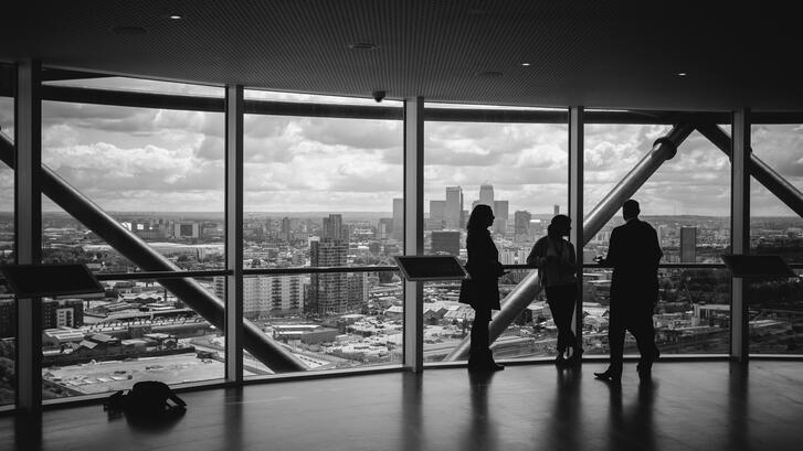 People standing inside city building