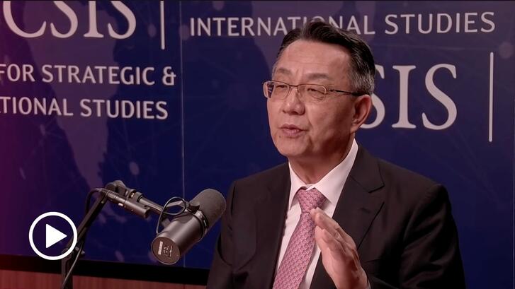 Gi-Wook Shin speaks to a microphone during a video podcast in a studio of the Center for Strategic and International Studies. 