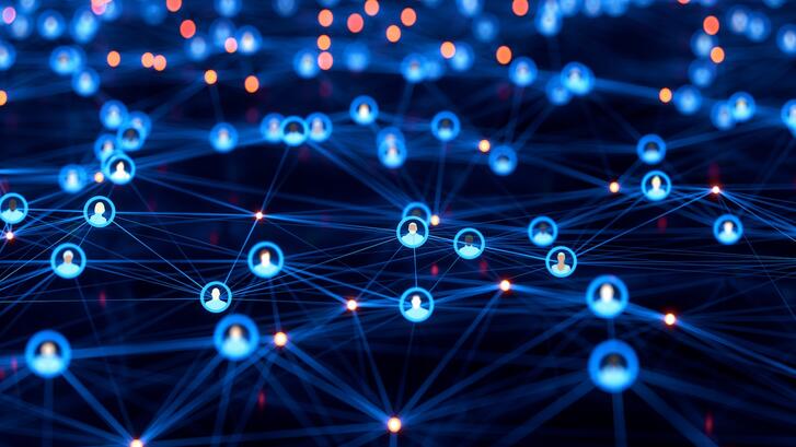 Illustration conveying the concept of social network connections, with connected avatars of anonymous people.