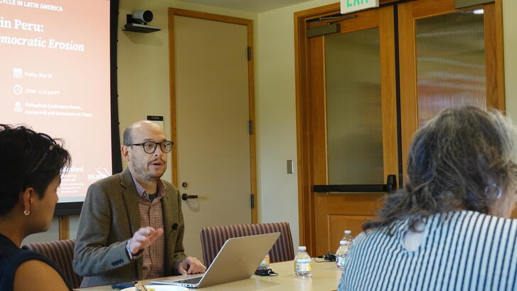 Alberto Vergara addresses a largely student audience at Stanford during his talk on democratic hollowing on May 15, 2026.