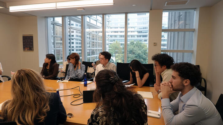 Students engage with a presentation during a site visit during Honors College.