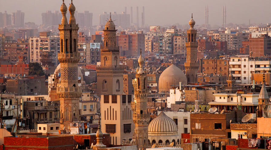 Mosques with Minarets and Traditional Architecture of Historic Cairo - stock photo