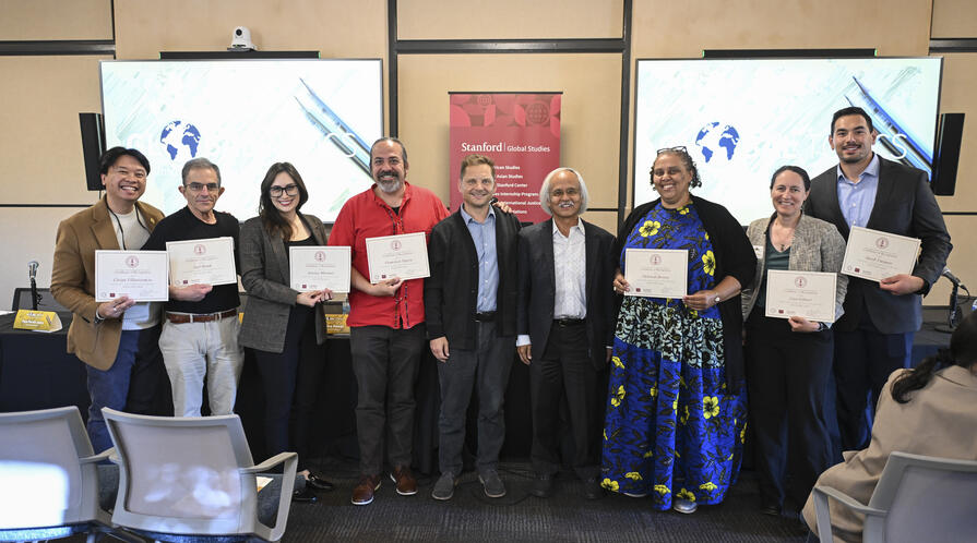 group of people standing in a room