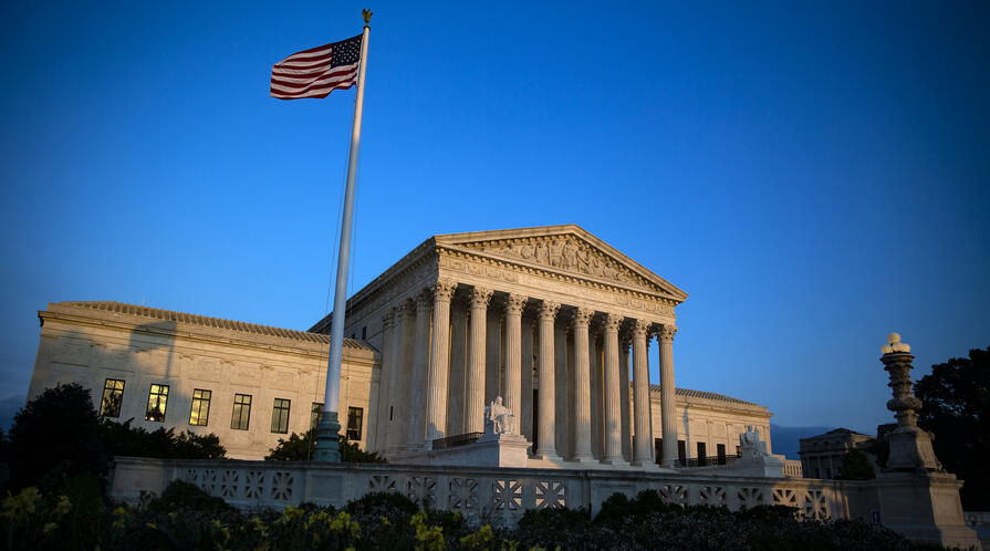 American flag in front of the Supreme Court