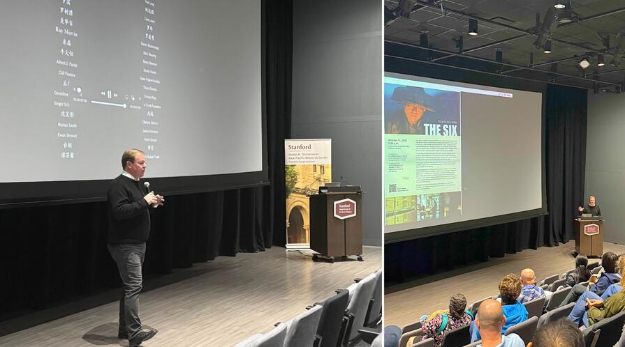 Steven Schwankert on a theater stage at a screening and discussion of the documentary 'The Six.'