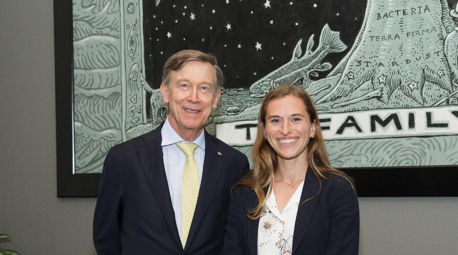 MIP Student Ella Genasci Smith posing with Senator John Hickenlooper