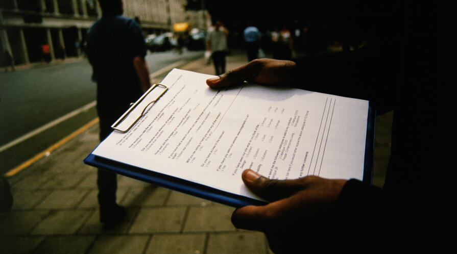 Market researcher on the street