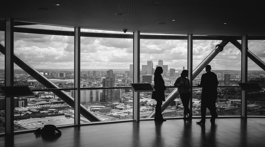 People standing inside city building