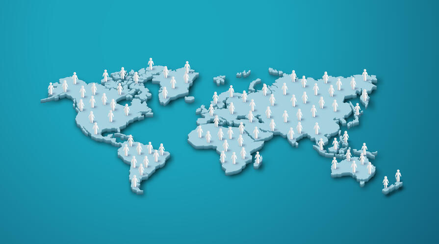 Paper-cut style illustration of people on a world map