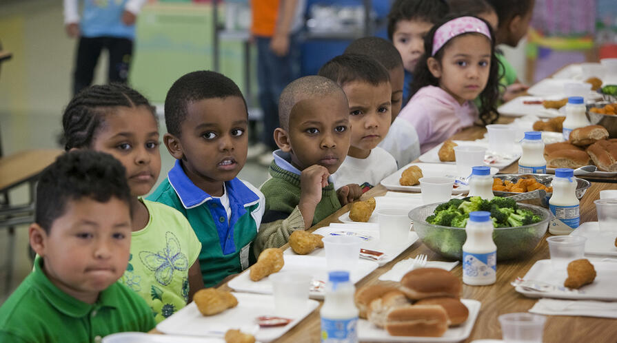 Students sit for school lunch at an elementary school in Silver Spring, Maryland. | Getty Images
