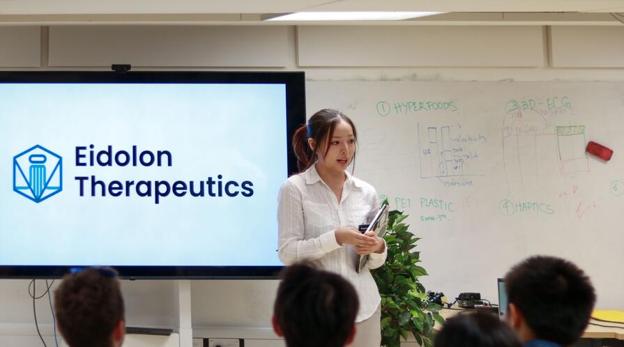 a person giving a presentation in a classroom
