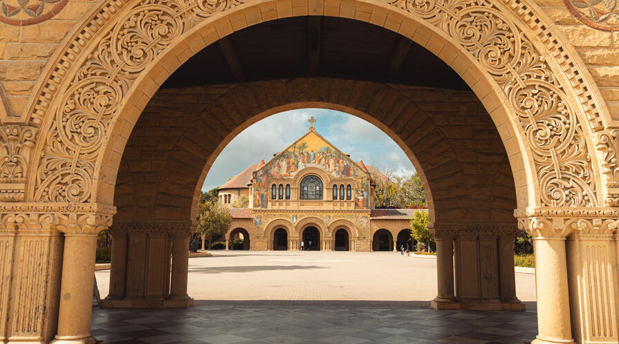 church facade appearing through an archway