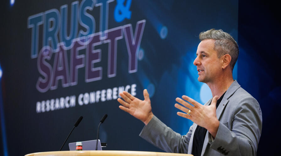Man speaking at a podium