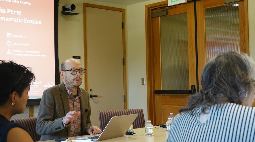 Alberto Vergara addresses a largely student audience at Stanford during his talk on democratic hallowing on May 15, 2026.