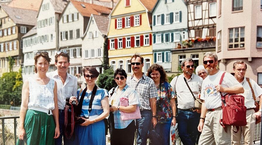 9 people posing for a photo in Germany