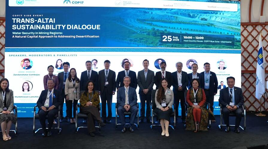Panelists gather for a group photo. 