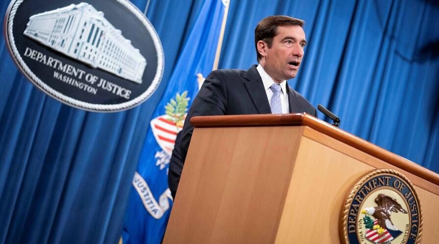 Assistant Attorney General for National Security John C. Demers speaks during a virtual news conference at the Department of Justice