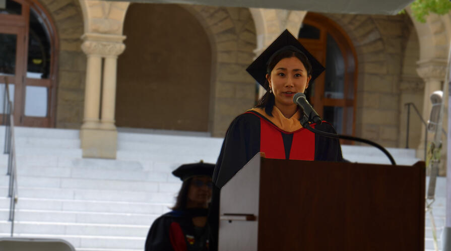 Class of 2022 graduate Soomin Jun addresses classmates at their graduation ceremony Class of 2022 graduate Soomin Jun addresses classmates at their graduation ceremony