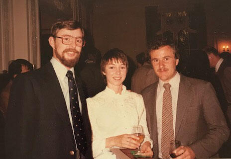 three people at a reception