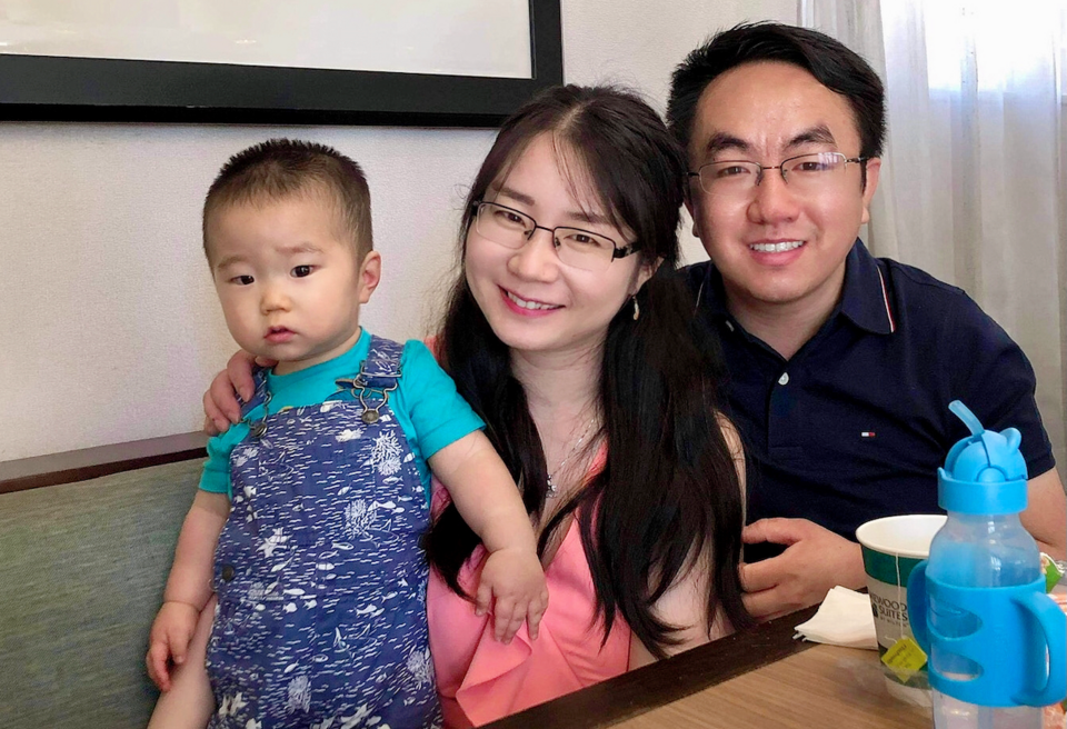 Hao Xue with his wife and baby son. 